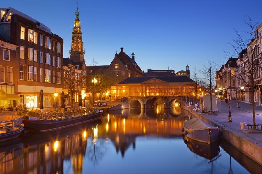 The Koornbrug Bridge at Botermarkt in Leiden is especially one of the most beautiful places in the city in the evening hours.