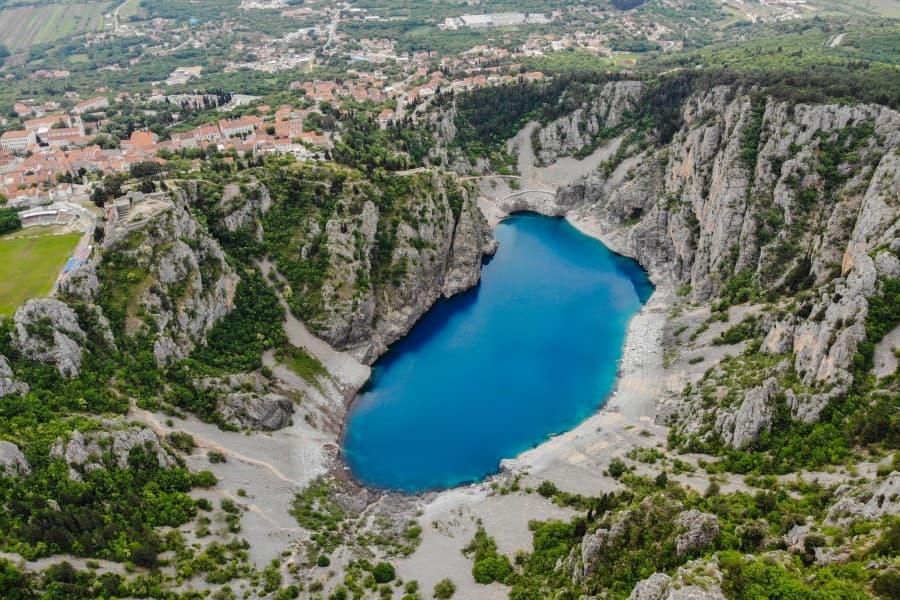 The Blue Lake (Croatian: Modro jezero or Plavo jezero) is a karst lake located near Imotski in Croatia. It is situated in a deep pit, possibly formed by the collapse of a giant cave.
